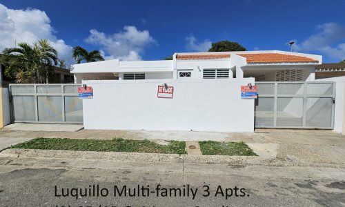 Front of Luquillo home for sale gates closed